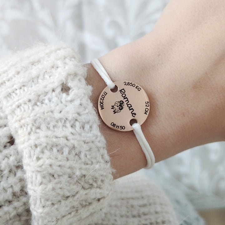 Bracelet avec médaille de naissance