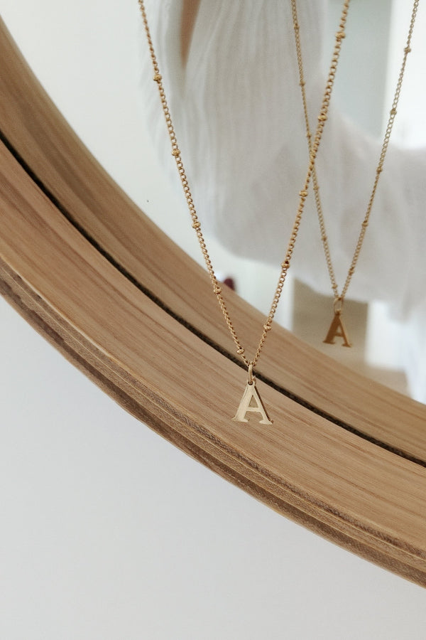 Collier en acier inoxydable avec lettre