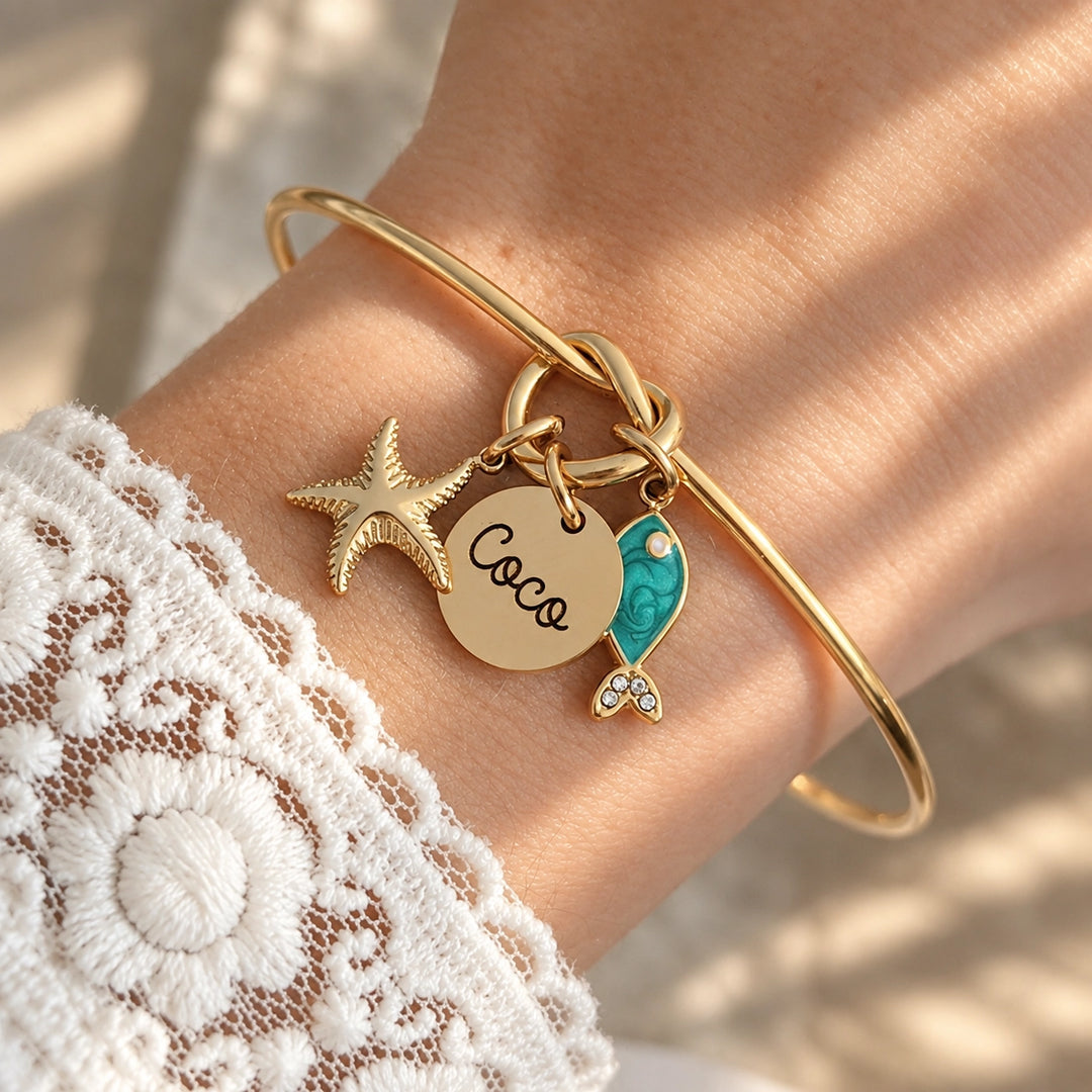 Bracelet jonc noeud avec charms dorés à composer