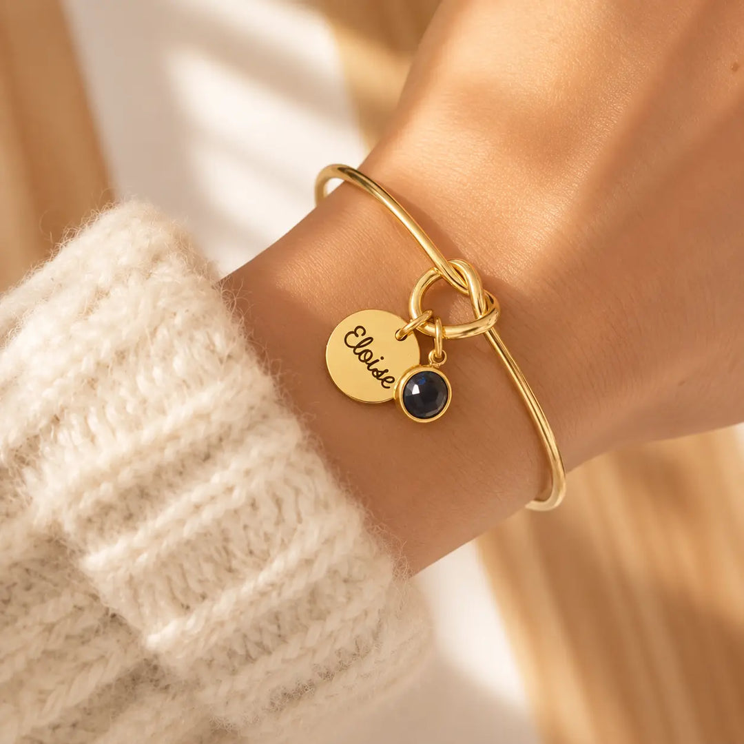 Bracelet jonc noeud doré avec pierre de naissance bleu