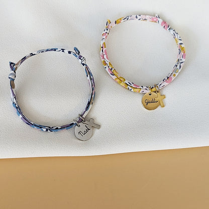 Bracelet Liberty avec médaille et croix